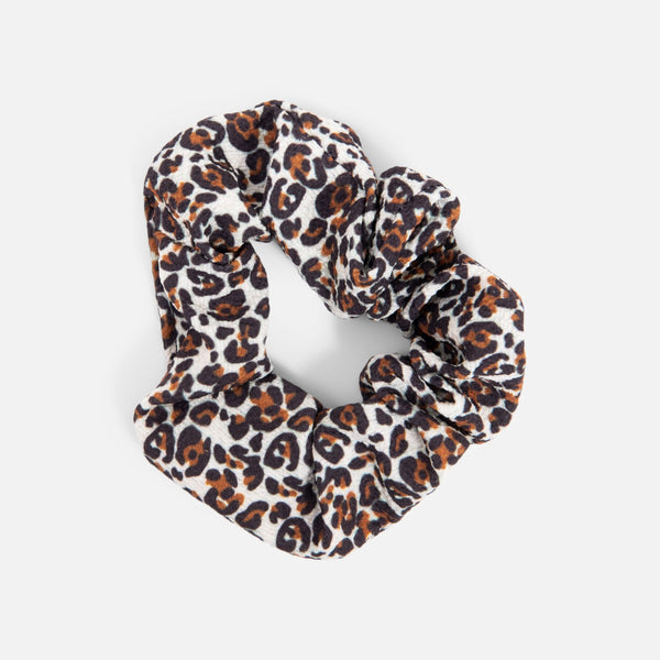 Load image into Gallery viewer, Set of three animal print scrunchies.
