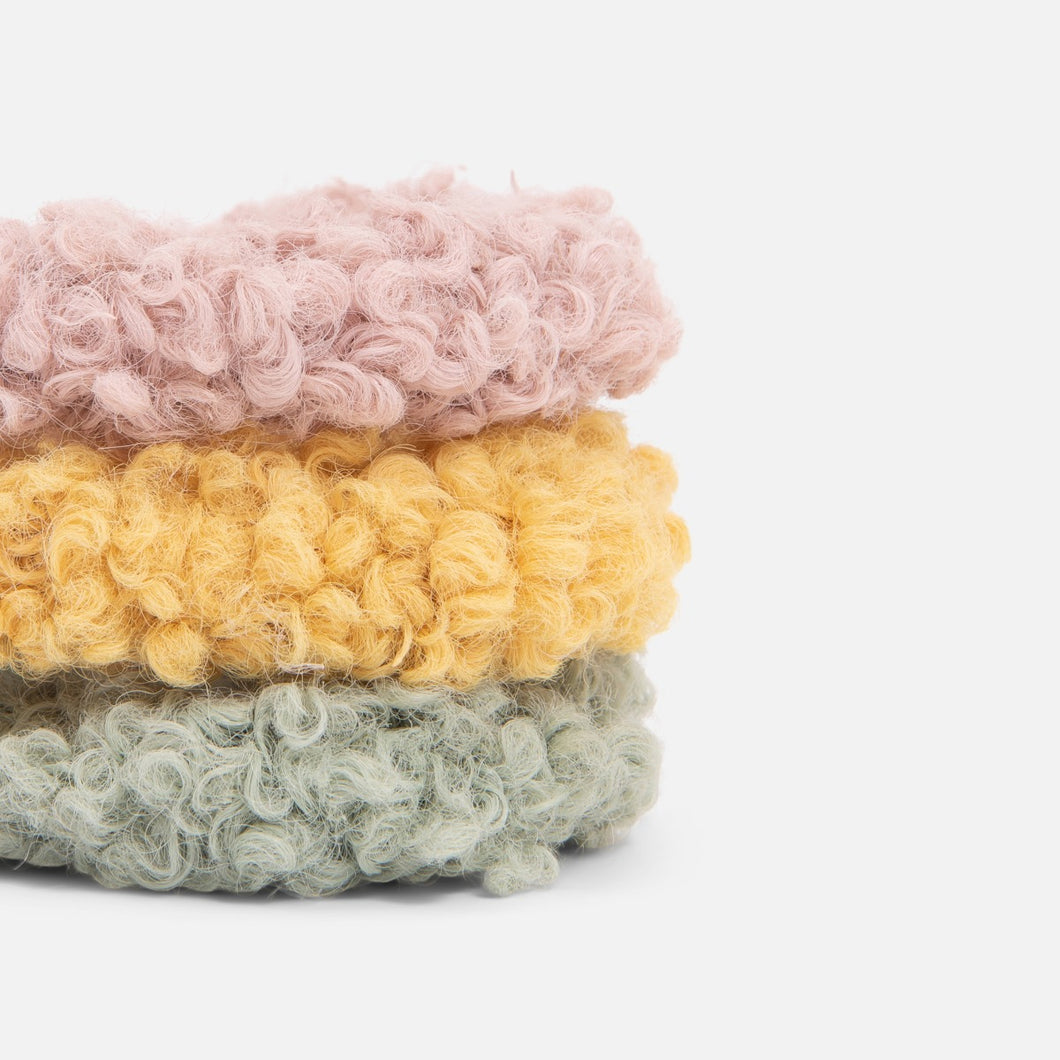 Set of three plain pastel-colored scrunchies 