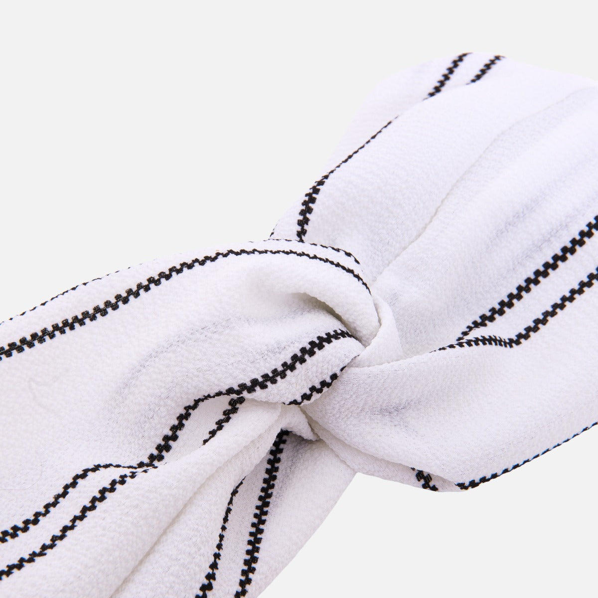 White headband with navy stripes