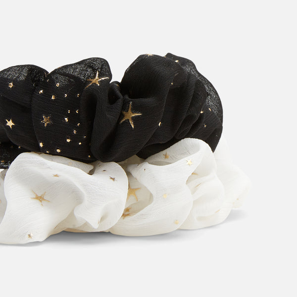Load image into Gallery viewer, Set of two black and white scrunchies with golden star print
