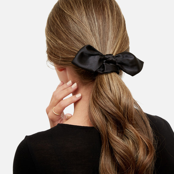 Load image into Gallery viewer, Set of 2 scrunchies in black and animal print with bows
