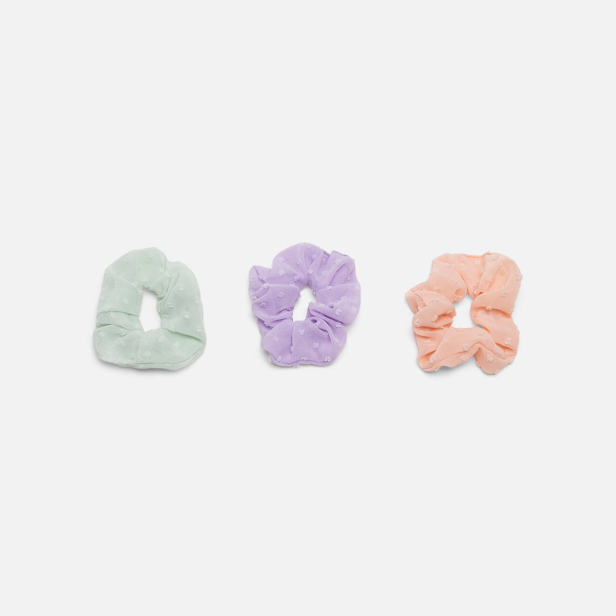 Trio of pink, lilac and green scrunchies
