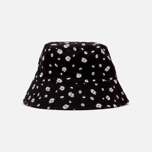 Load image into Gallery viewer, Black reversible bucket hat with white and yellow daisy print

