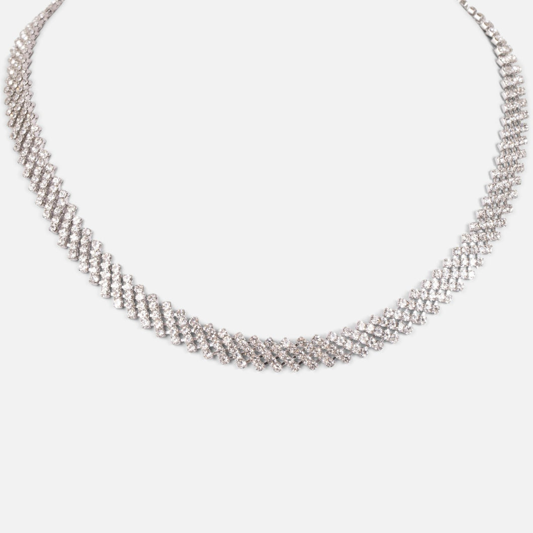 Silvered short necklace with diagonal glittering stones   