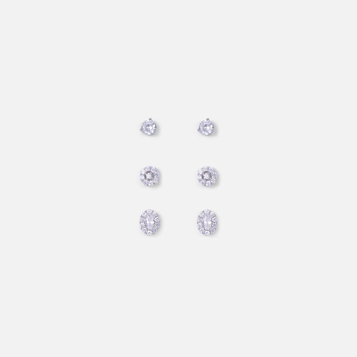 Trois paires de boucles d'oreilles fixes argentées