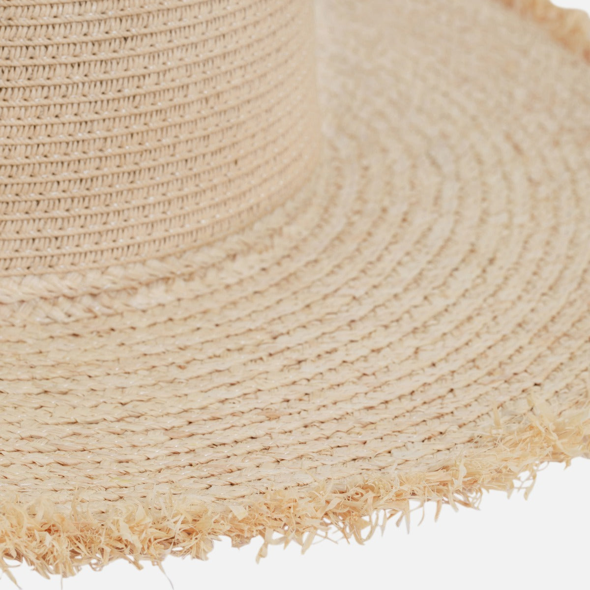 Dark beige straw floppy hat with outline and fringes