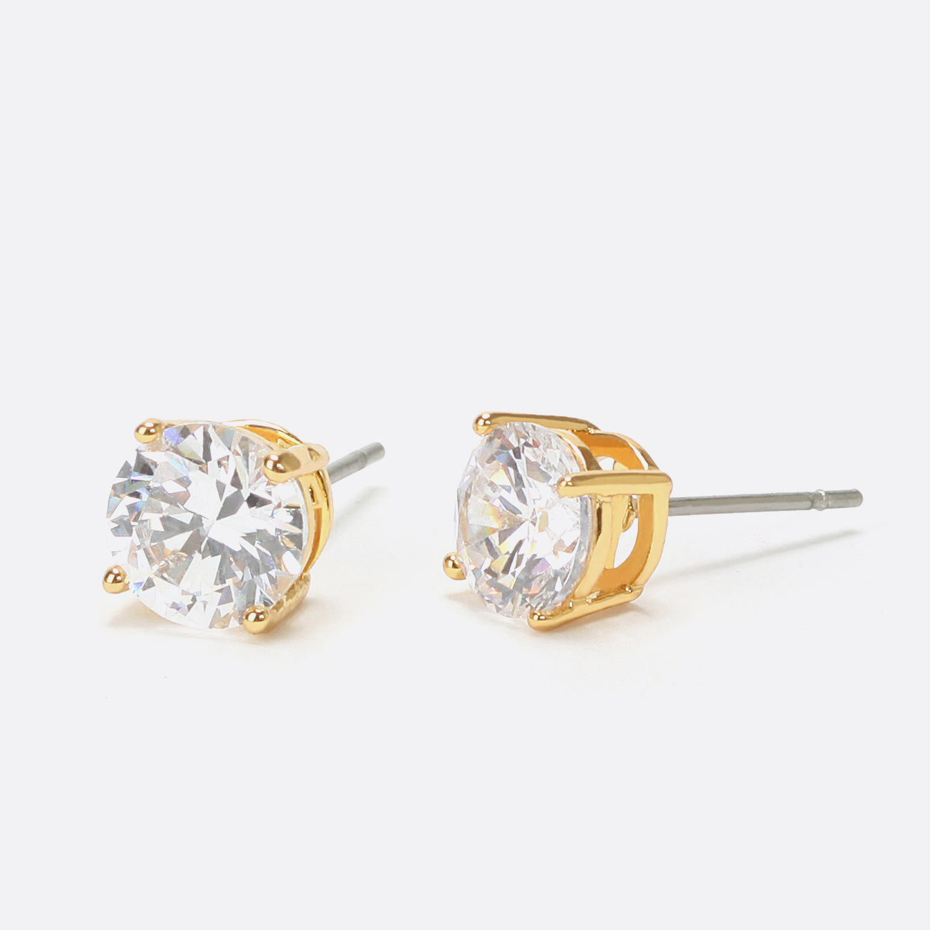 Fixed golden earrings with cubic zirconia
