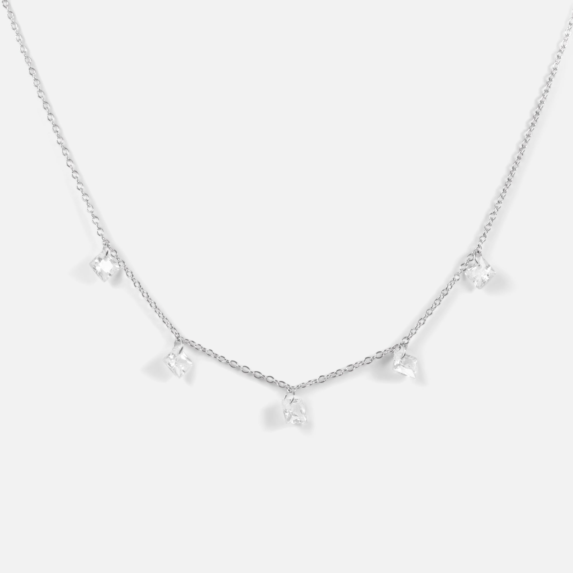 Silvered chain decorated with five cubic zirconia stones