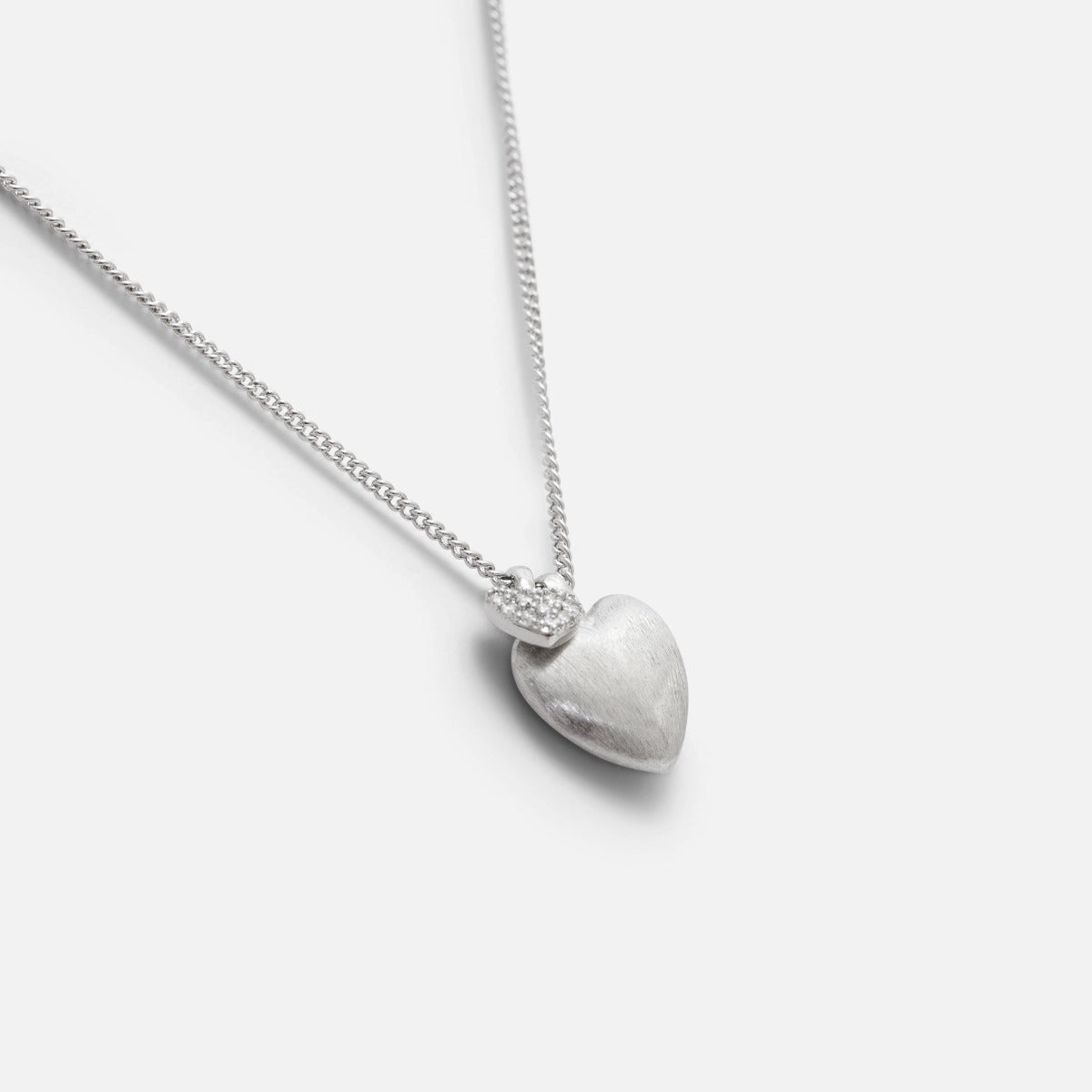 Silvered pendant with heart charms 