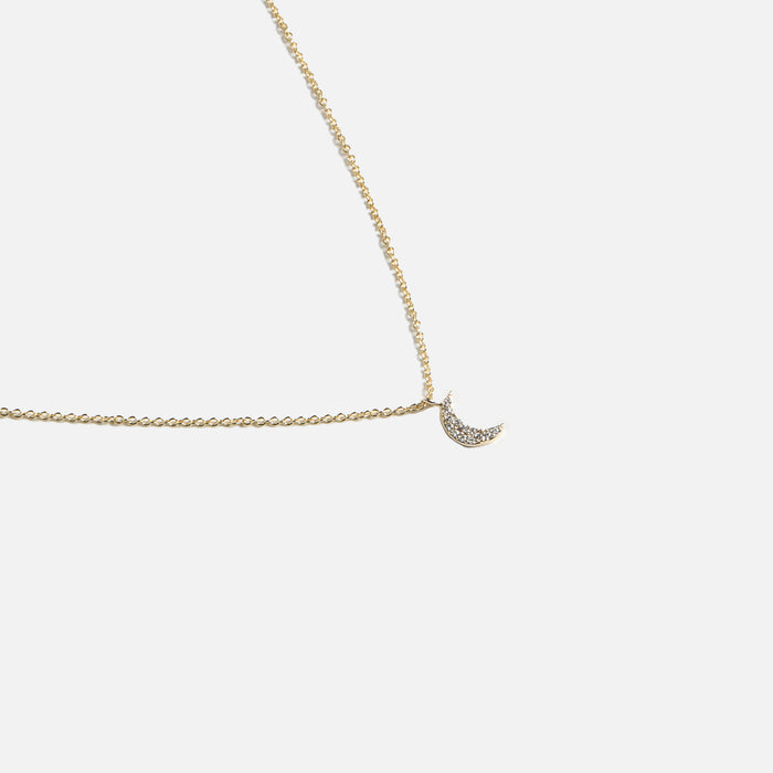 Pendentif doré avec breloque lune et zircons
