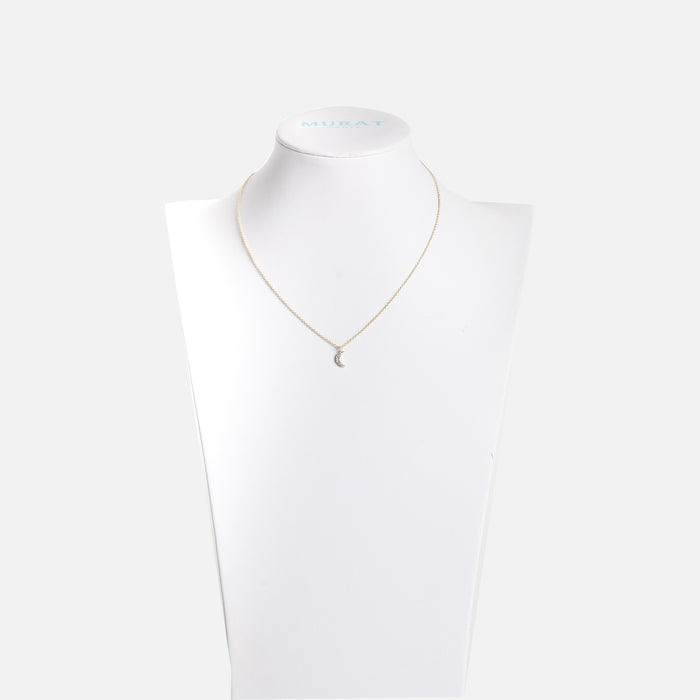 Pendentif doré avec breloque lune et zircons