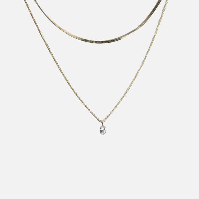 Chaîne double avec breloque en zircon