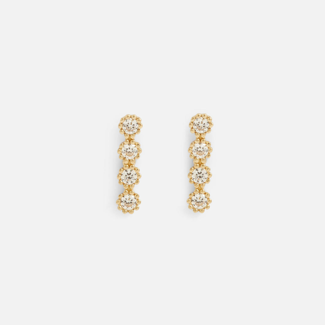 10k yellow gold earrings with four stones