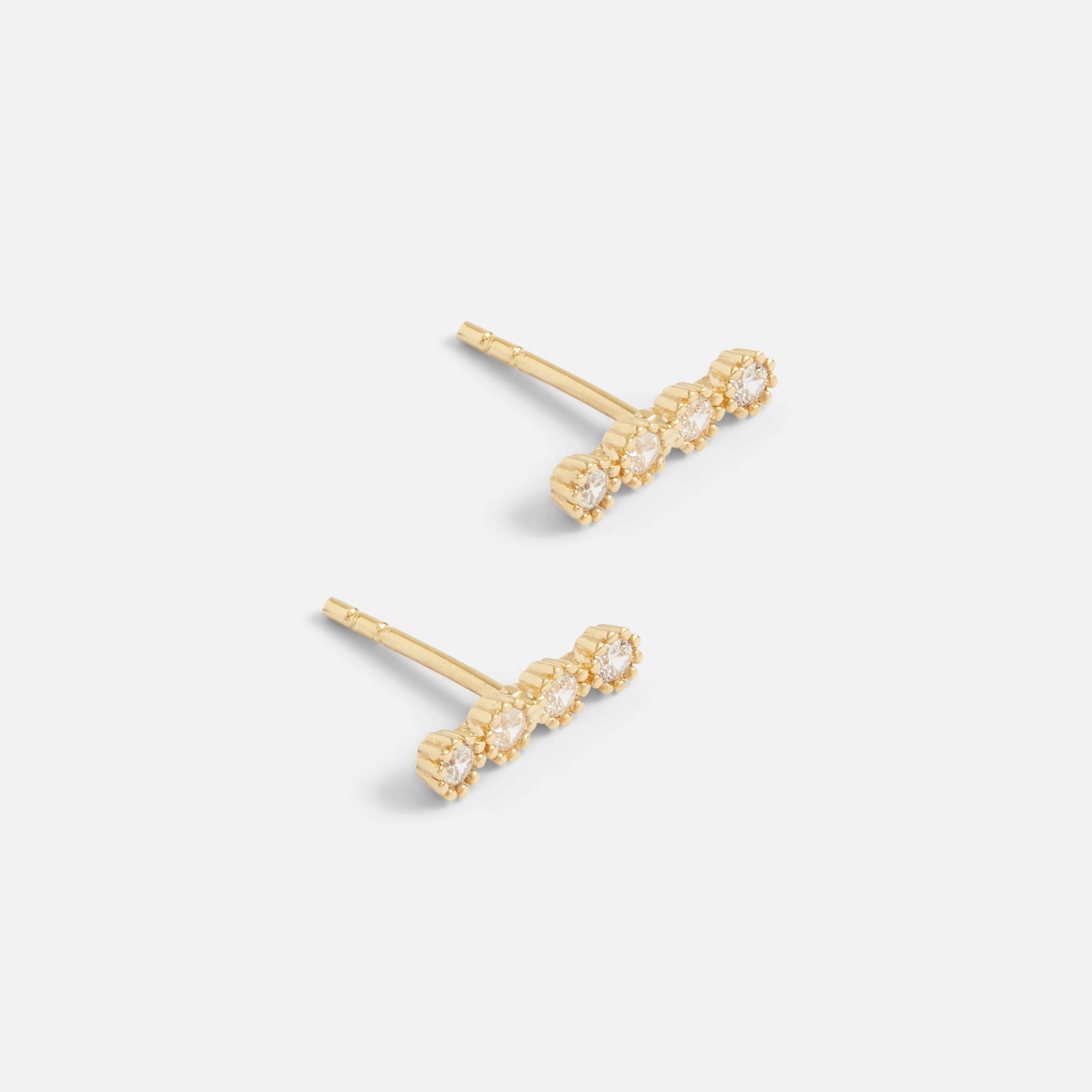 10k yellow gold earrings with four stones