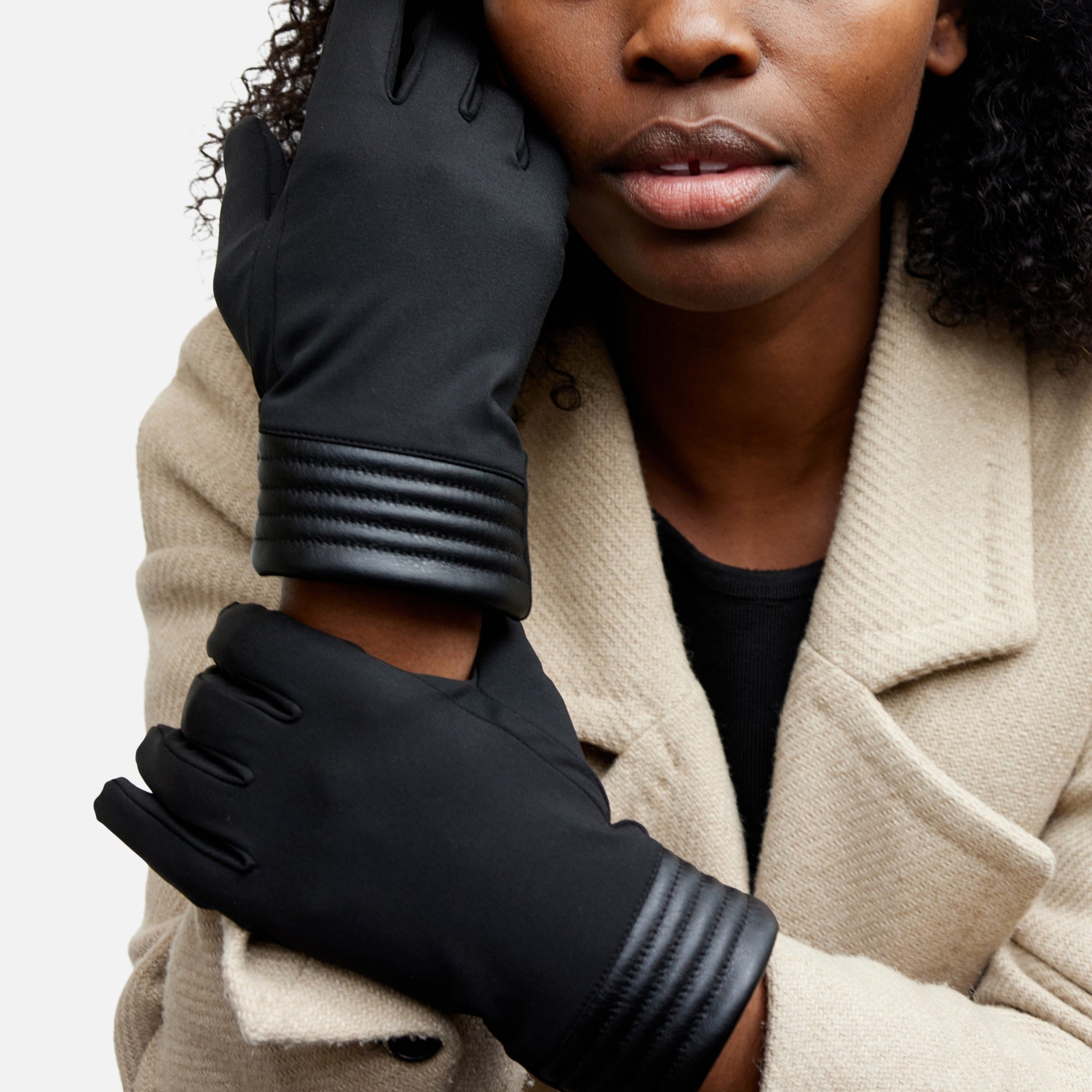 Black gloves with lined details at the cuffs