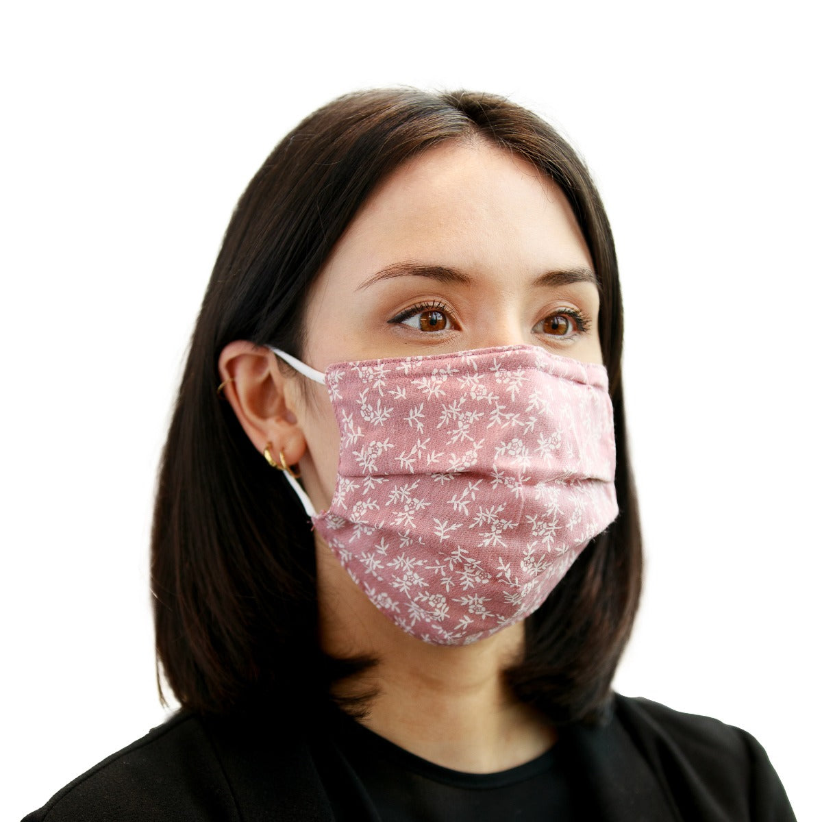 Reusable pink mask with small white flowers