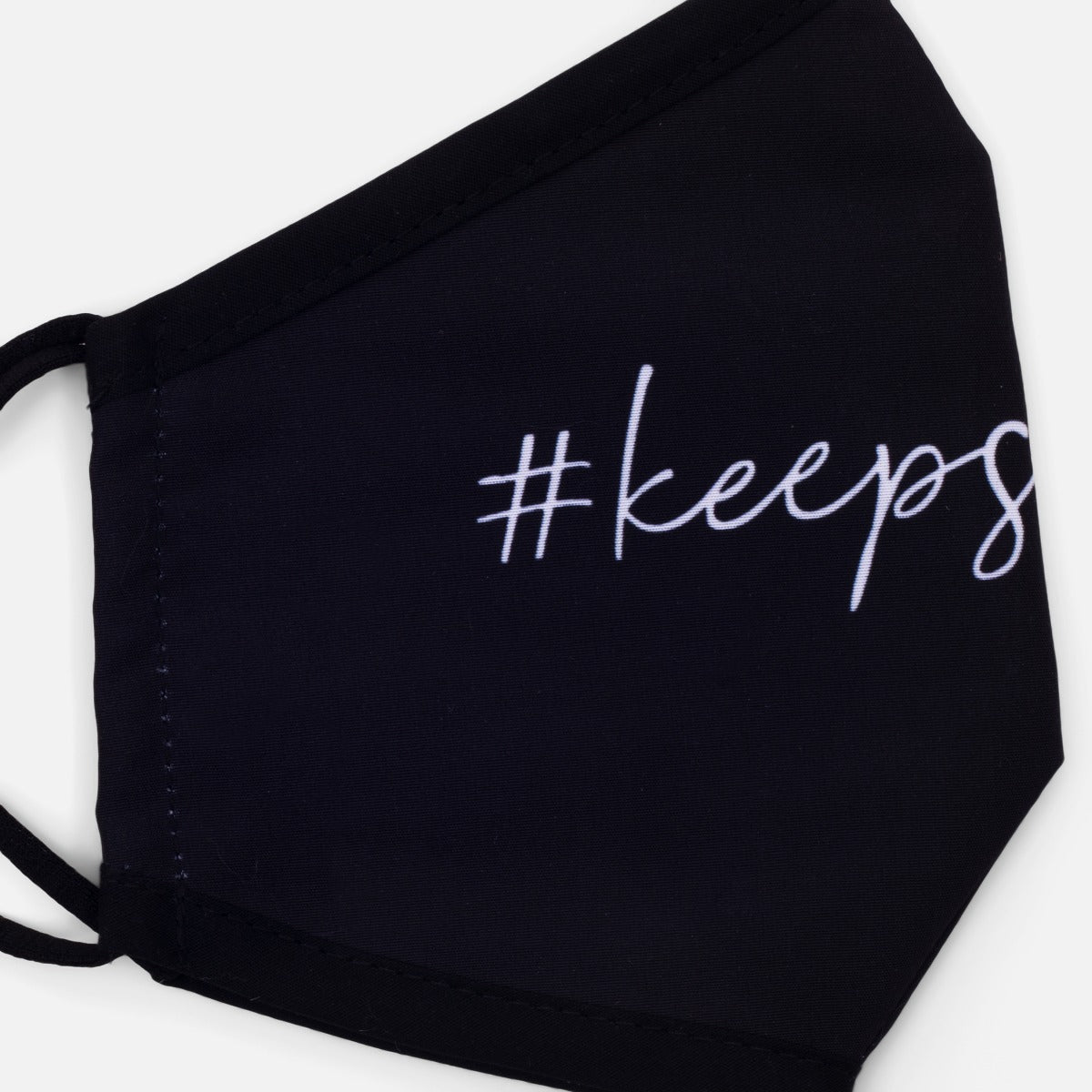 Masque réutilisable noir pour femme avec inscription ‘’#keepsmiling’’