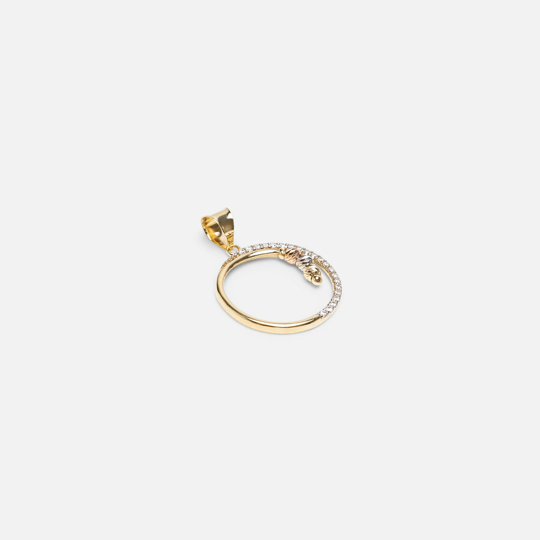 10k yellow gold circle charm with stones and pattern