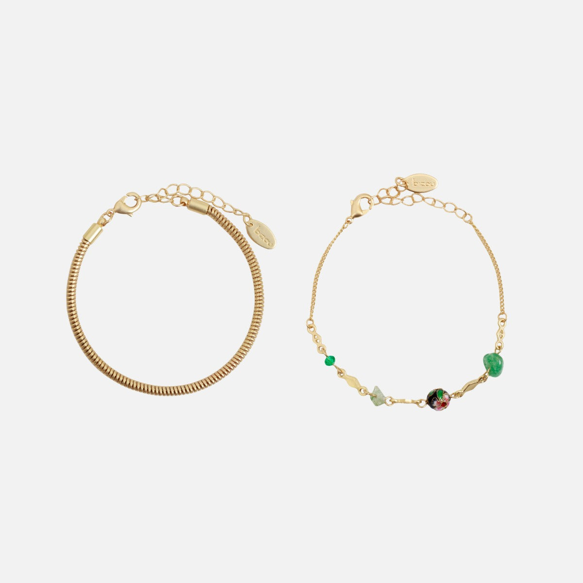 Set of two golden bracelets with green beads