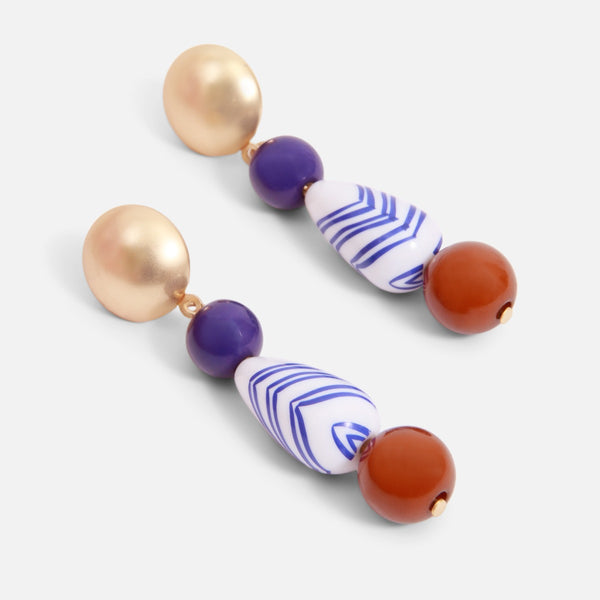 Load image into Gallery viewer, Long earrings with white, blue and red beads
