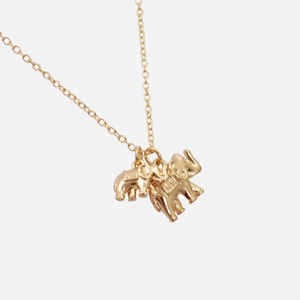 Golden necklace with small charm duo of elephants