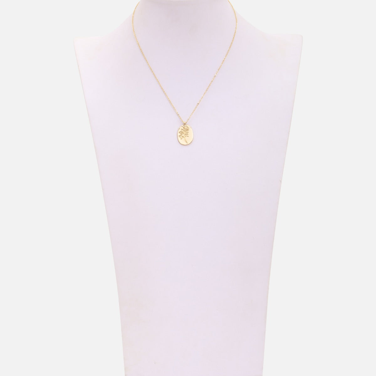 Golden necklace with engraved rose charm