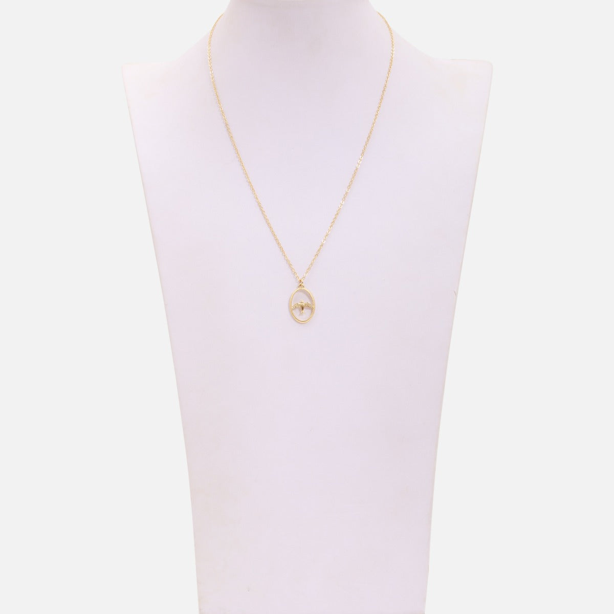 Golden necklace with oval bird charm 