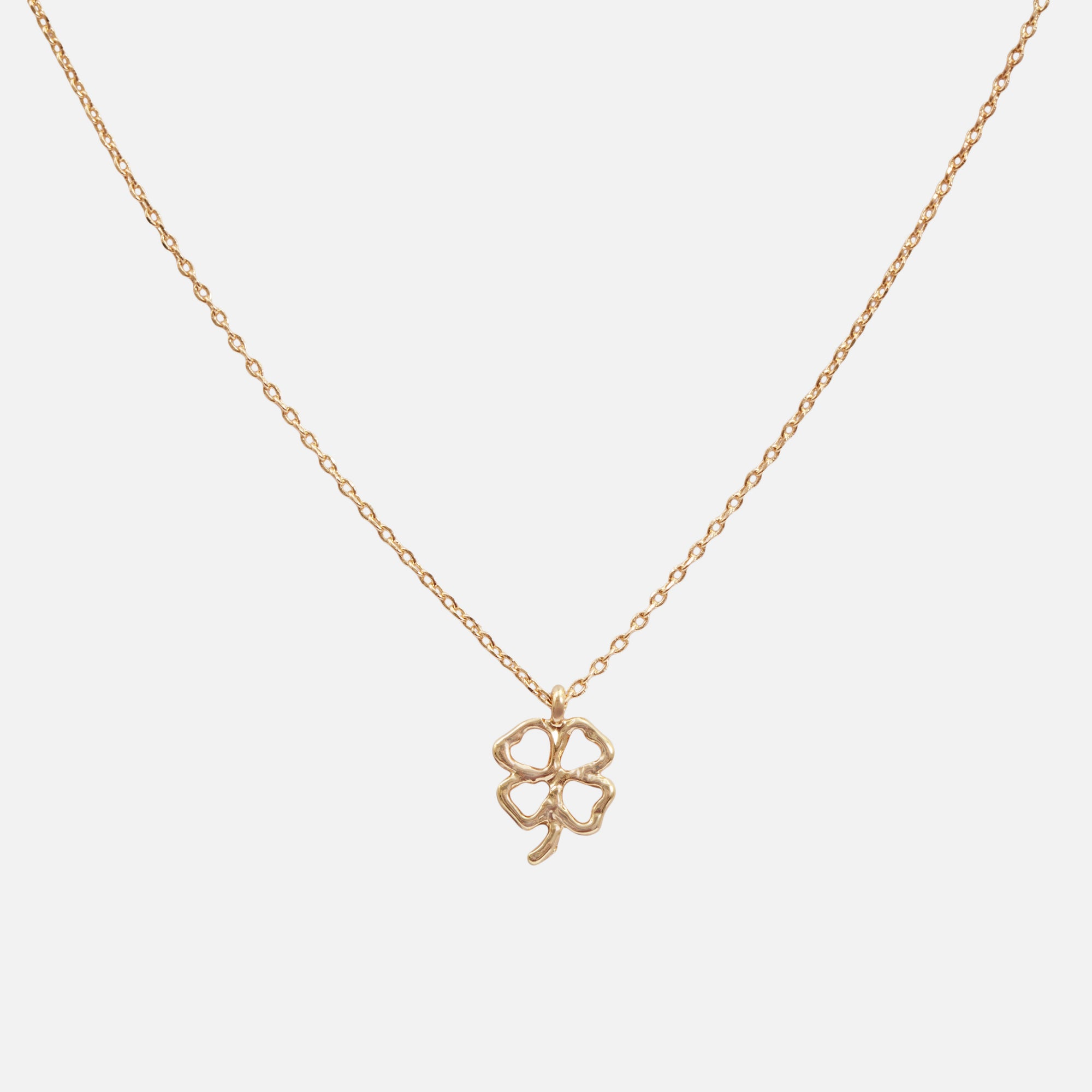 Golden necklace with lucky clover charm 