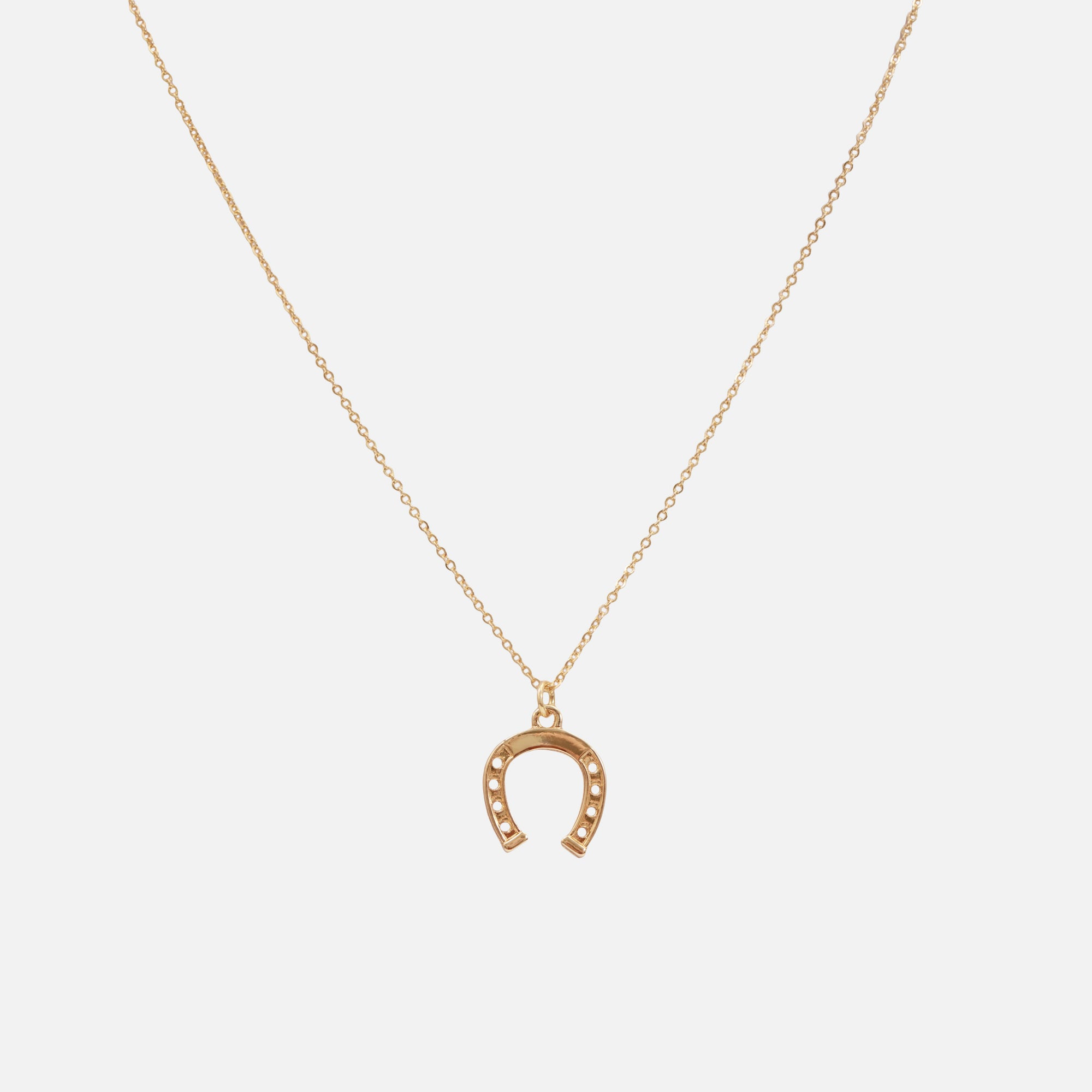Golden necklace with horseshoe charm 