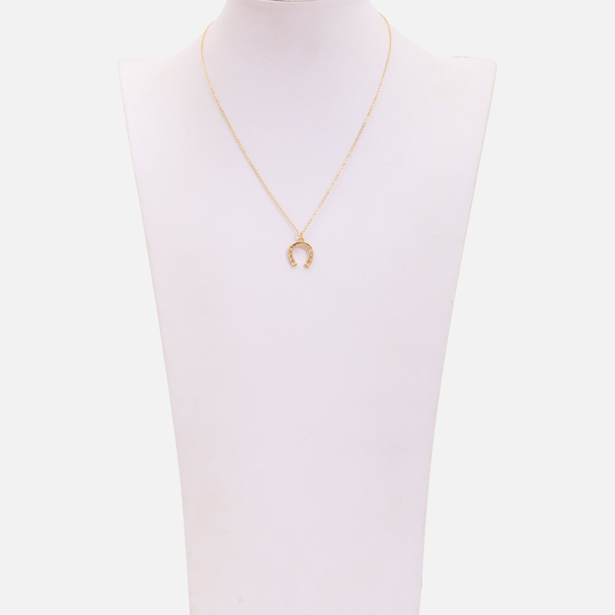 Golden necklace with horseshoe charm 
