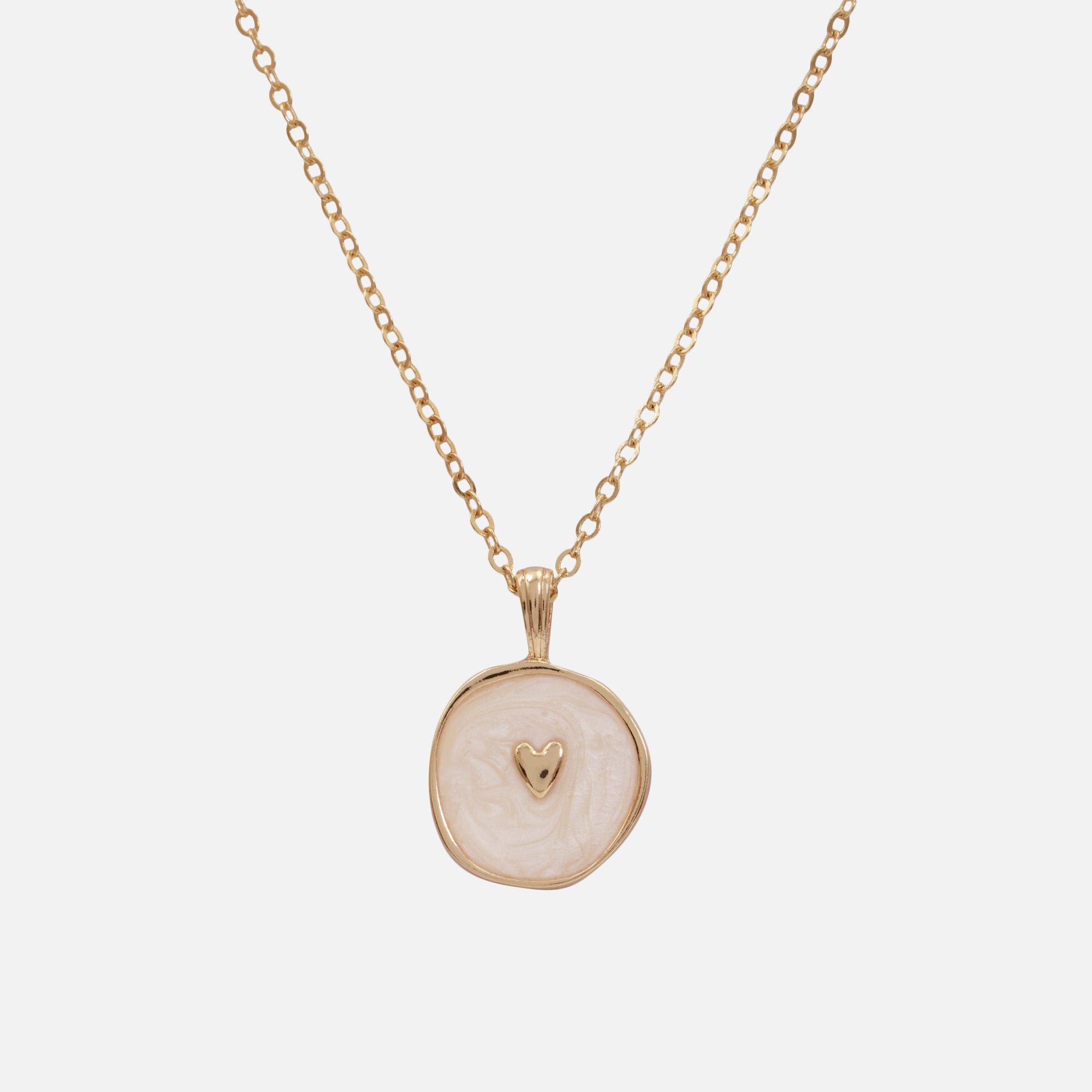 Necklace with white medallion and golden heart