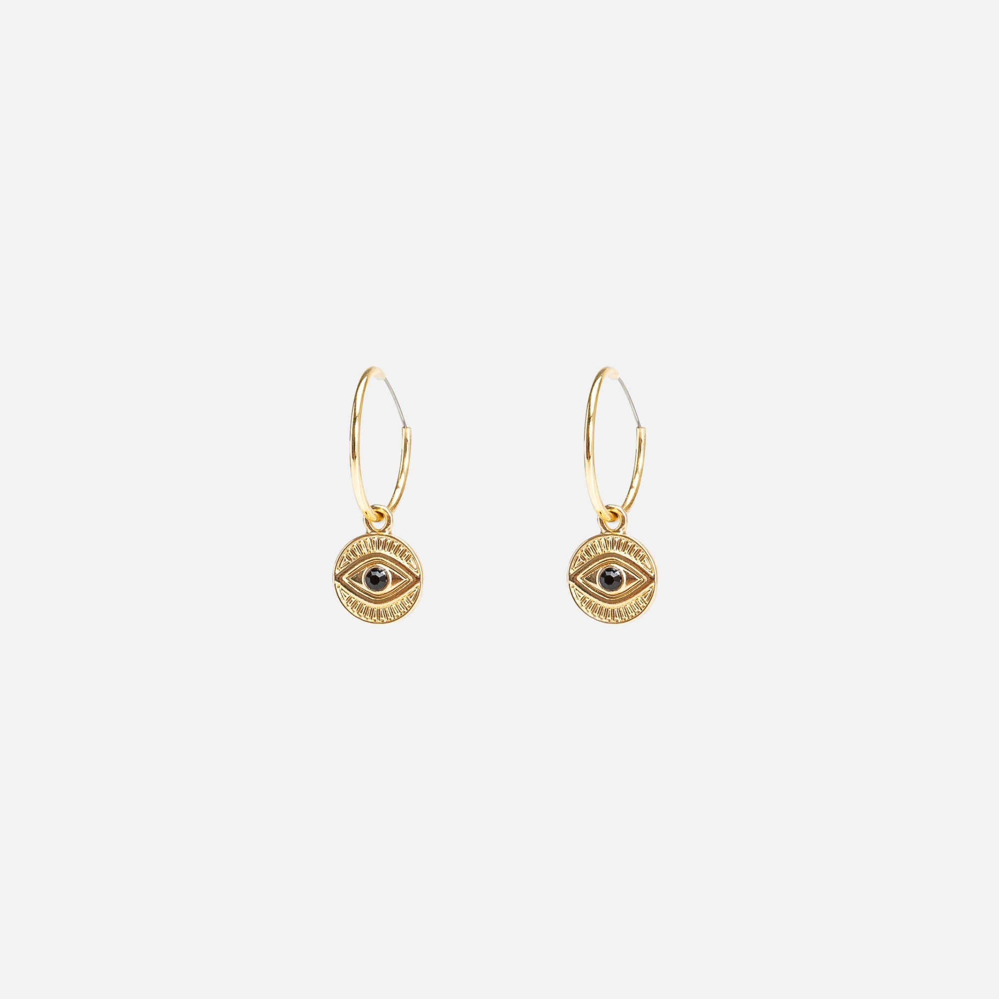 Golden hoop earrings with eye charm