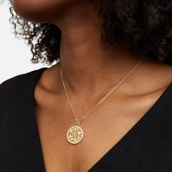 Load image into Gallery viewer, Golden pendant with circular medallion
