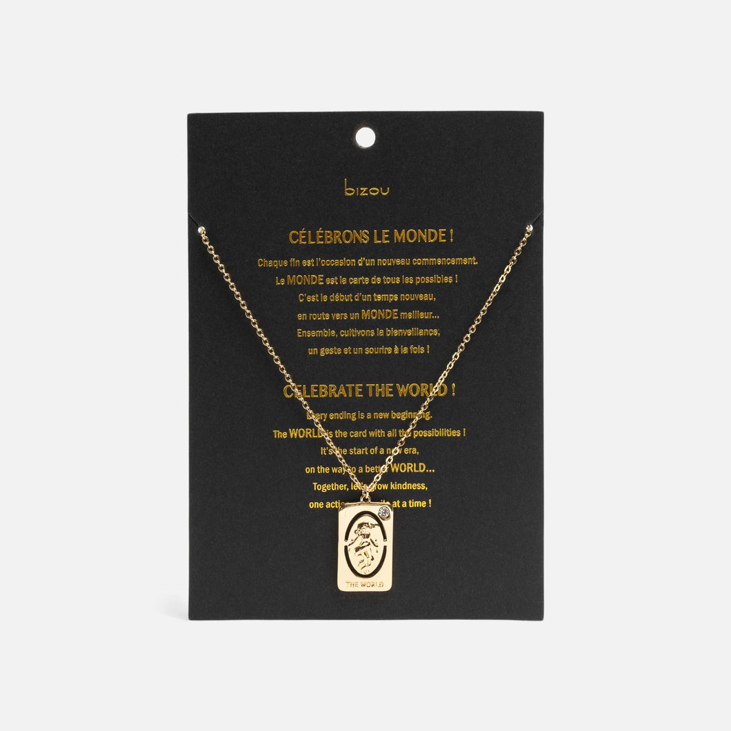 Golden pendant with world tarot card