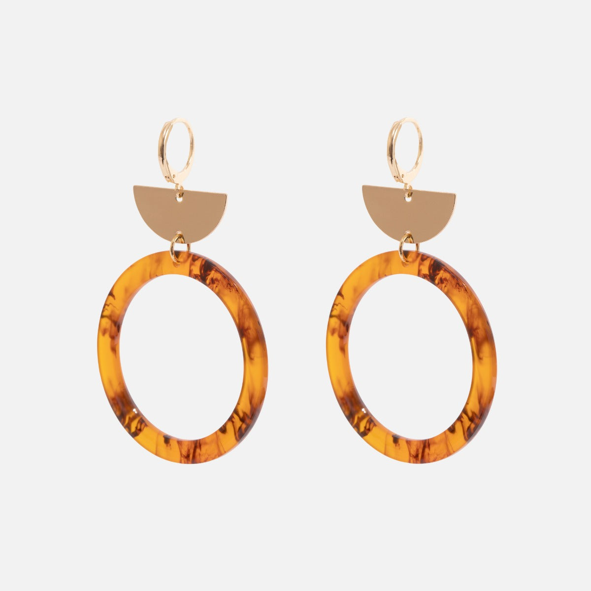 Long golden earrings with tortoise circle 