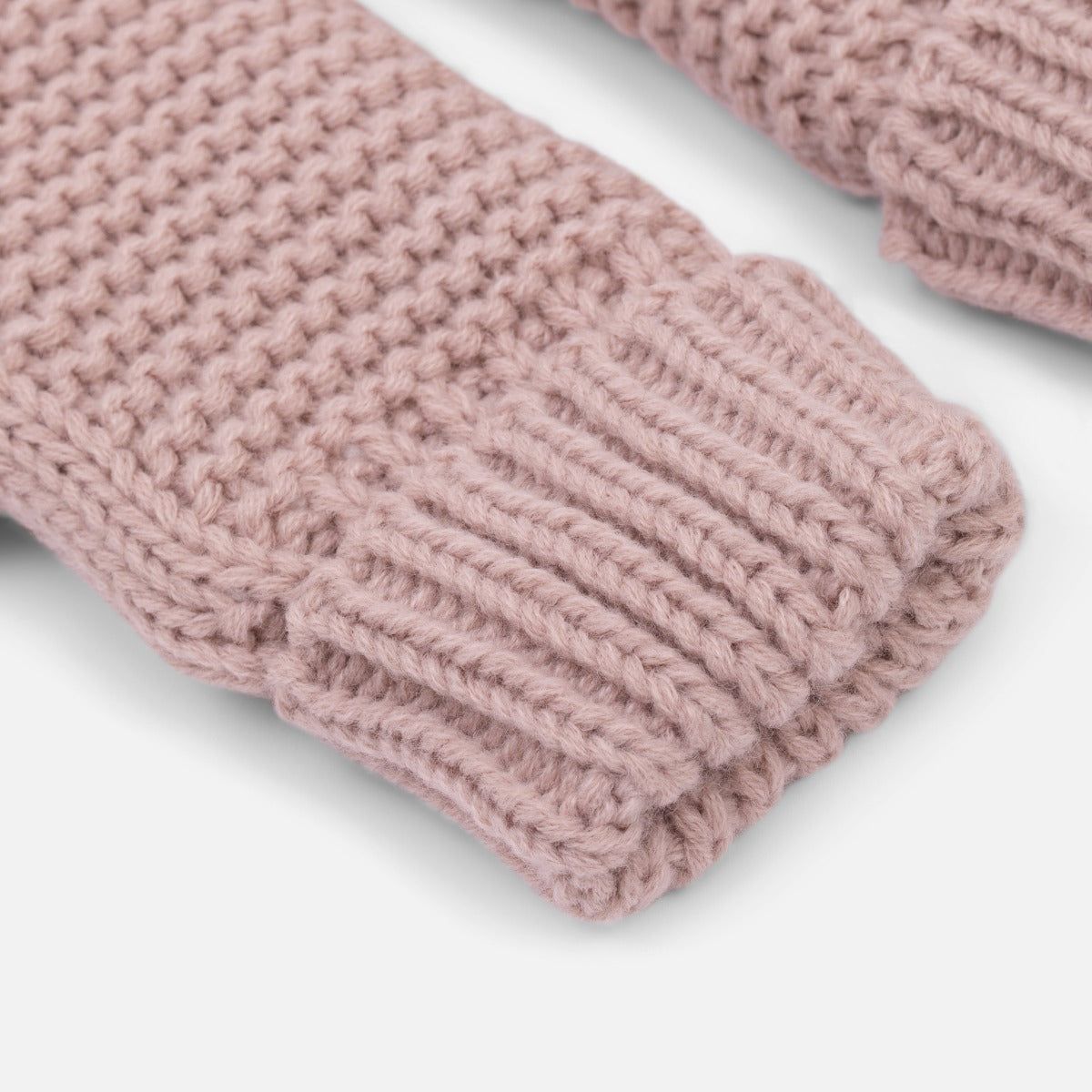 Old pink knit mittens