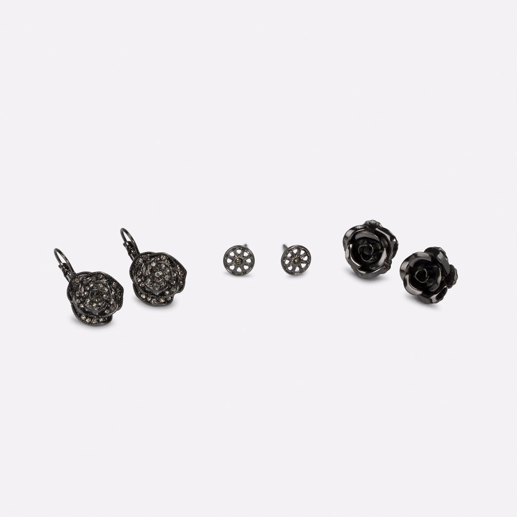 Three pairs of black earrings in bloom   
