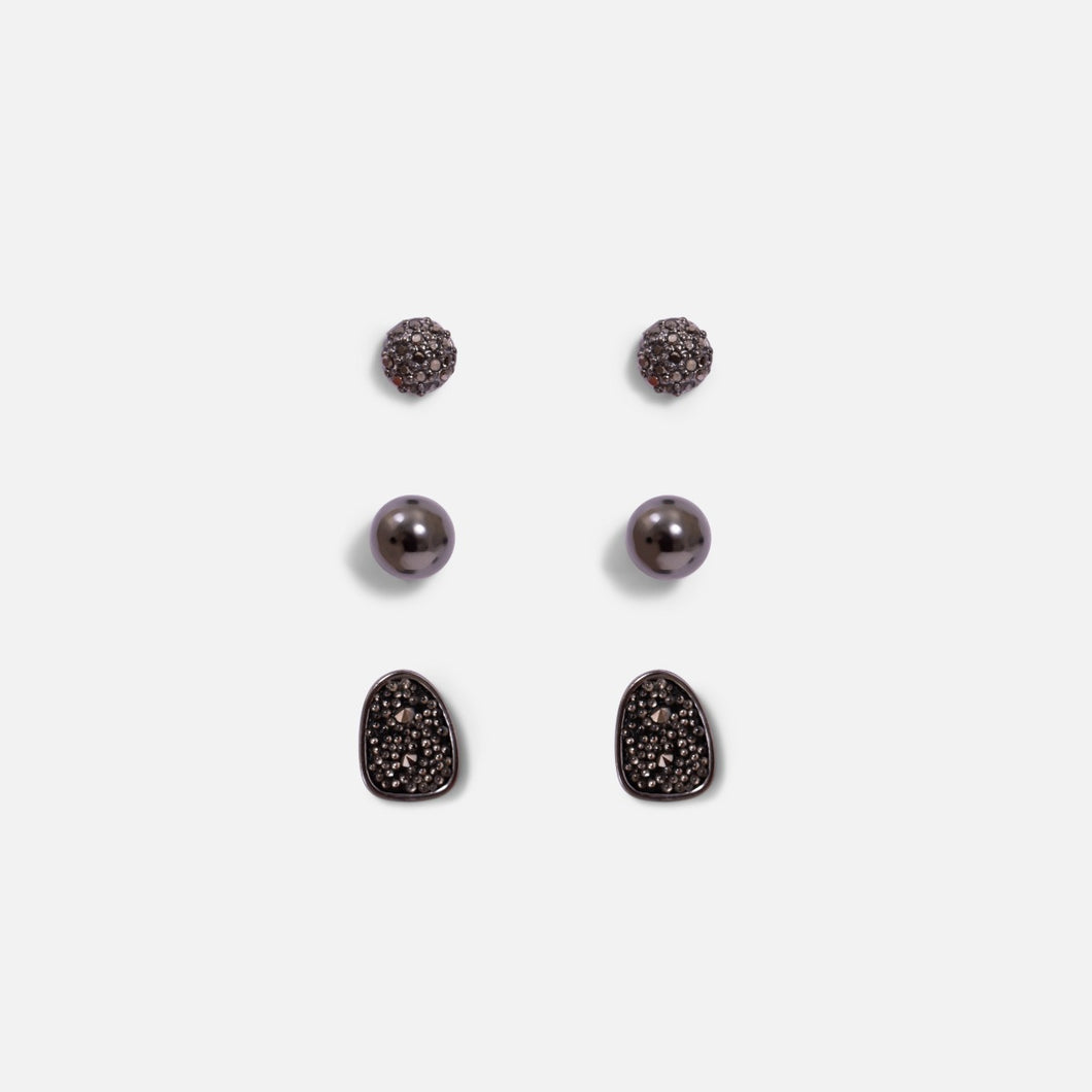 Trio of silvered and black earrings of different shapes