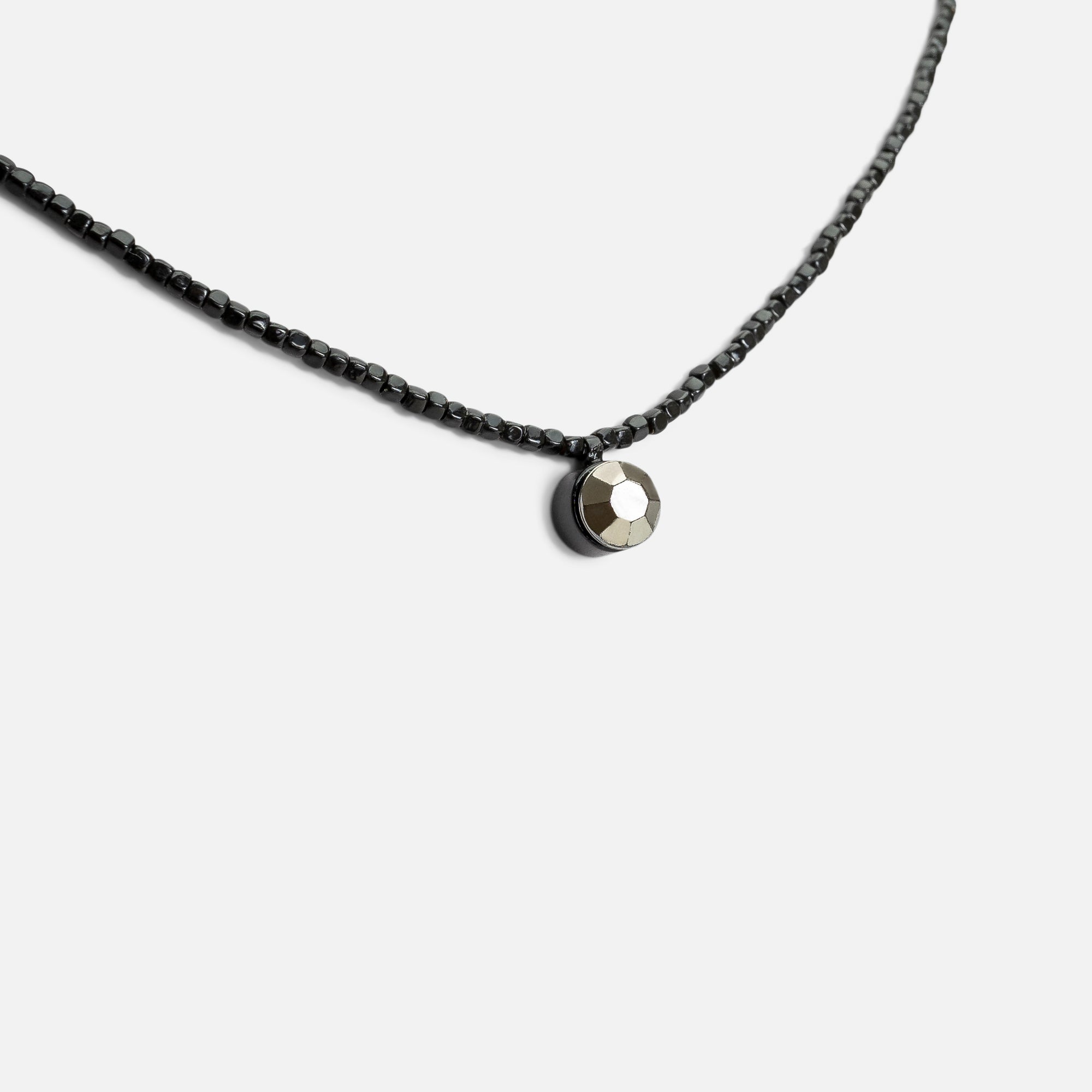 Short black bead necklace with pendant