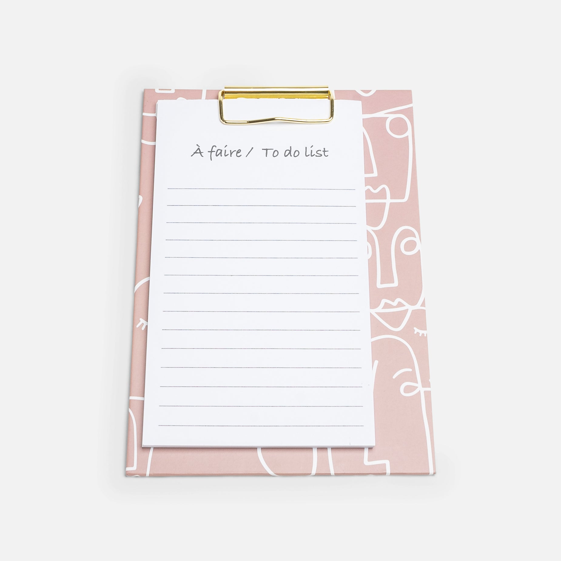 Pink abstract faces clipboard with notepad