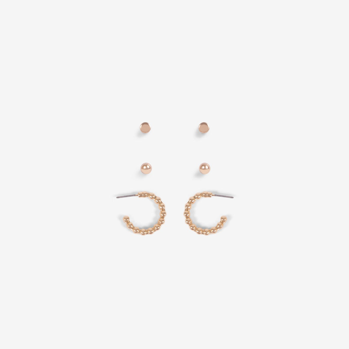 Trio of golden earrings hoops, beads and flat circles