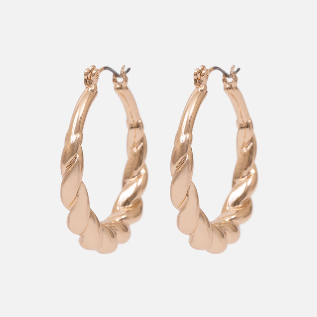 Boucles d’oreilles anneaux dorées avec torsade