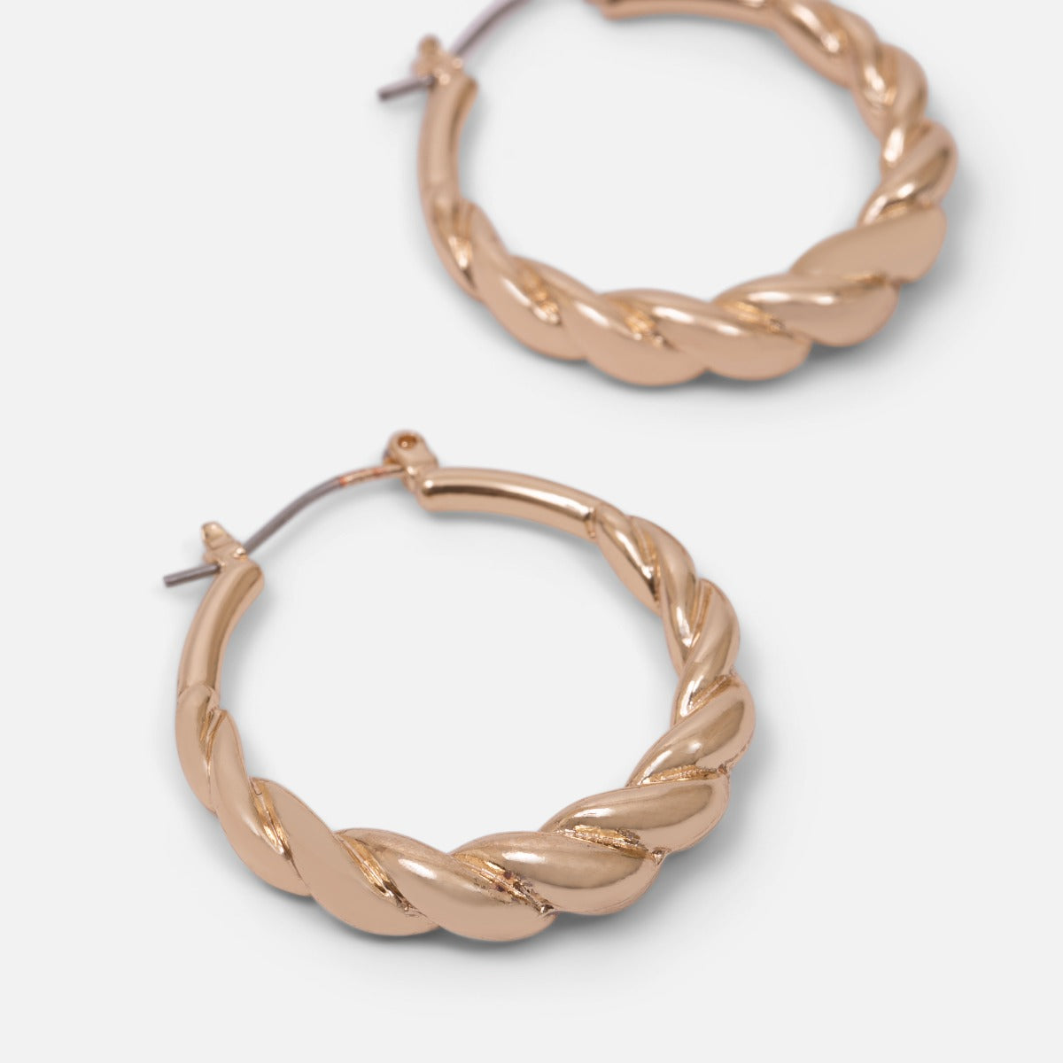 Golden twisted hoop earrings