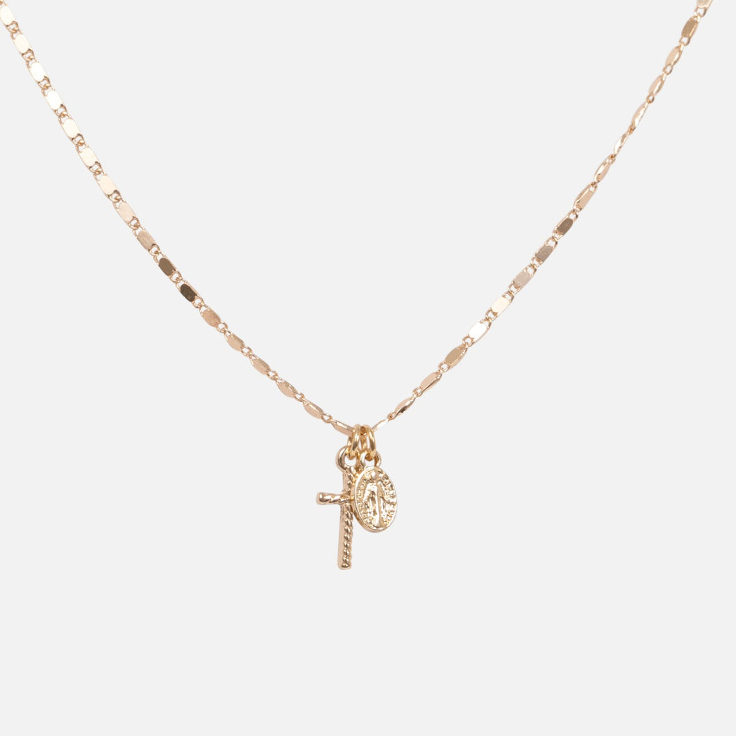 Golden pendant with oval and cross charms