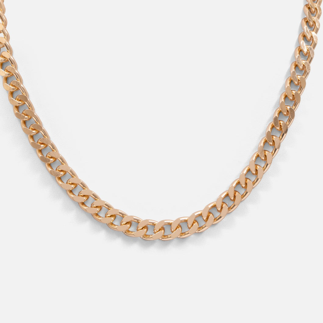Golden necklace with wide links 