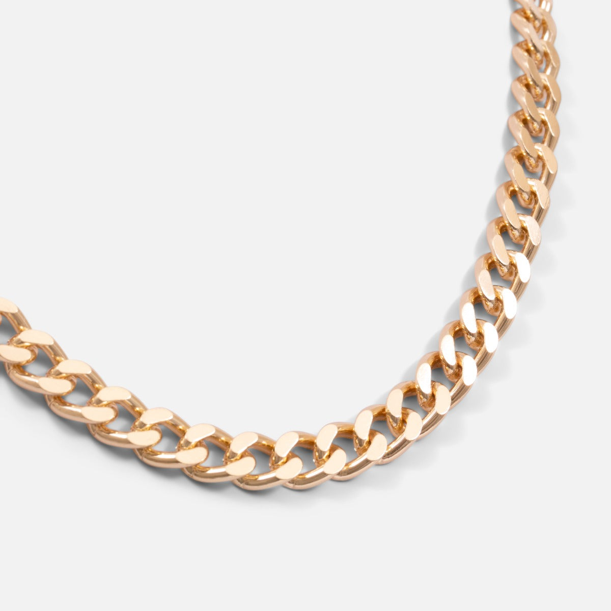 Golden necklace with wide links 