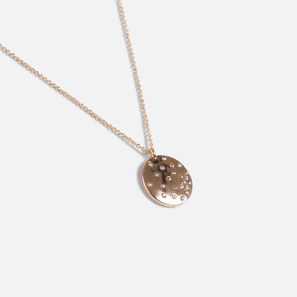 Load image into Gallery viewer, Golden pendant with small sparkling stars medallion
