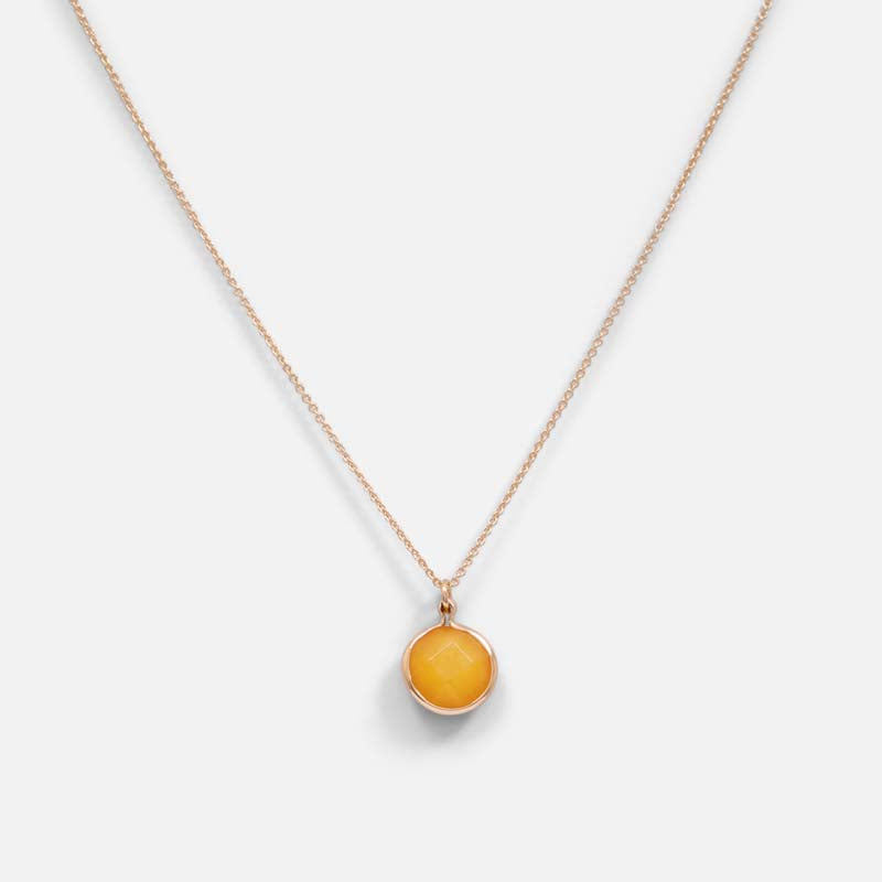 Golden pendant with yellow quartz effect charm