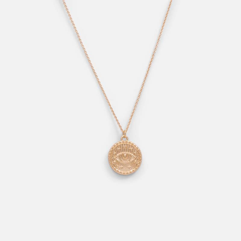 Golden pendant with protection eye charm