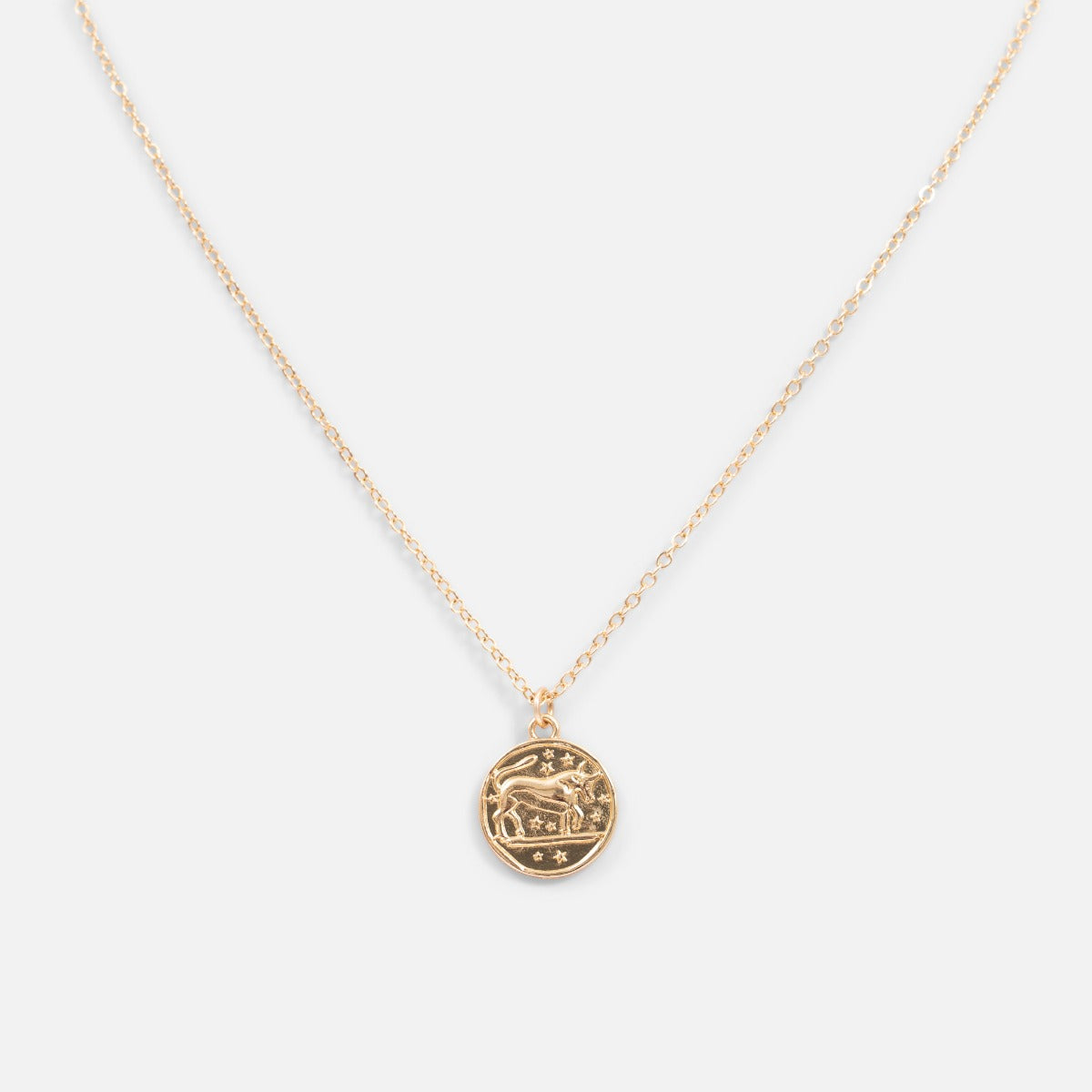 Golden pendant astrological sign "taurus"